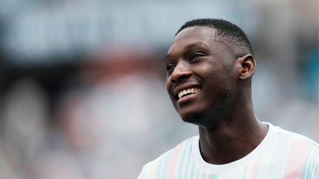Juventus ace Randal Kolo Muani smiles