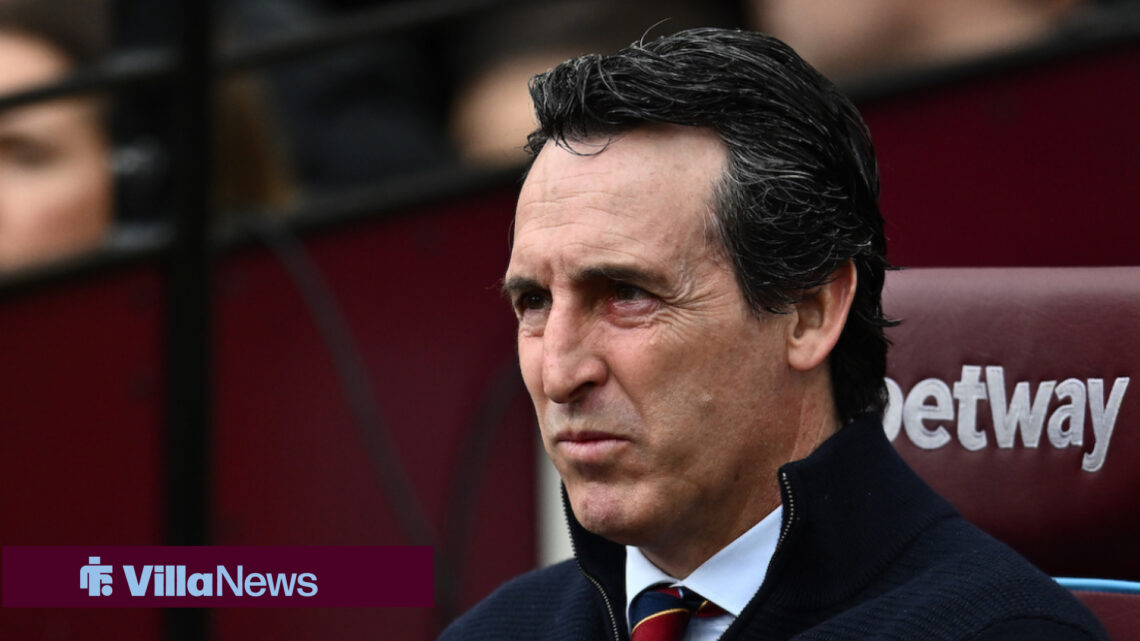 Aston Villa manager Unai Emery sitting in a dugout.