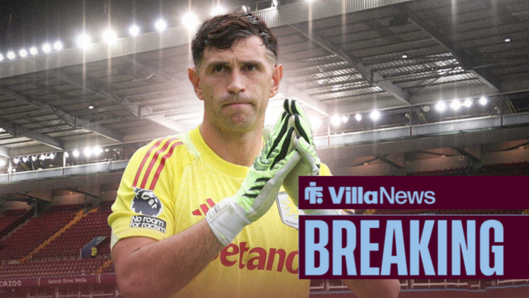 Emi Martinez clasps his gloves for Aston Villa