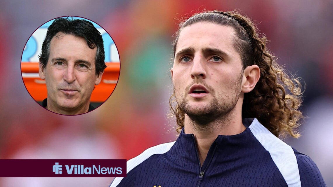 Adrian Rabiot looks towards Unai Emery who smiles.