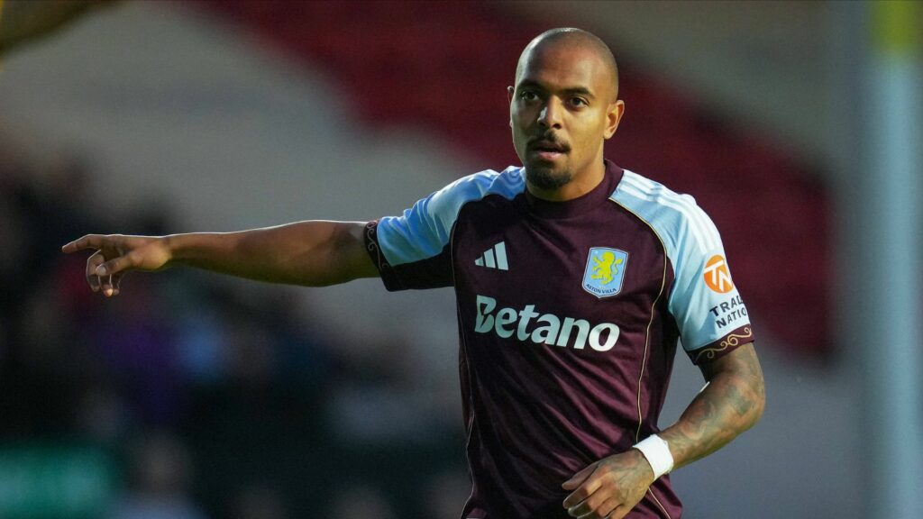 Aston Villa's Donyell Malen points