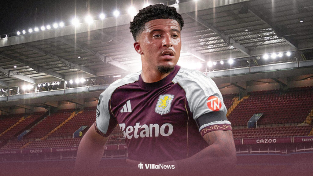 Jadon Sancho wearing an Aston Villa shirt at Villa park