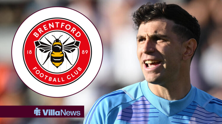 Emi Martinez looks on, with Brentford badge in circular frame