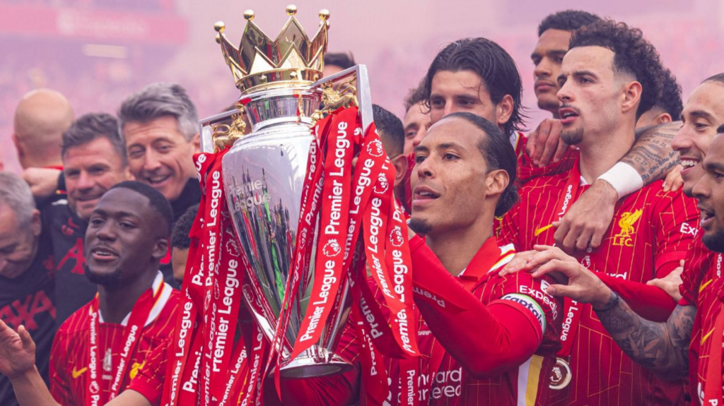 Virgil van Dijk lifting the Premier League trophy alongside his Liverpool teammates