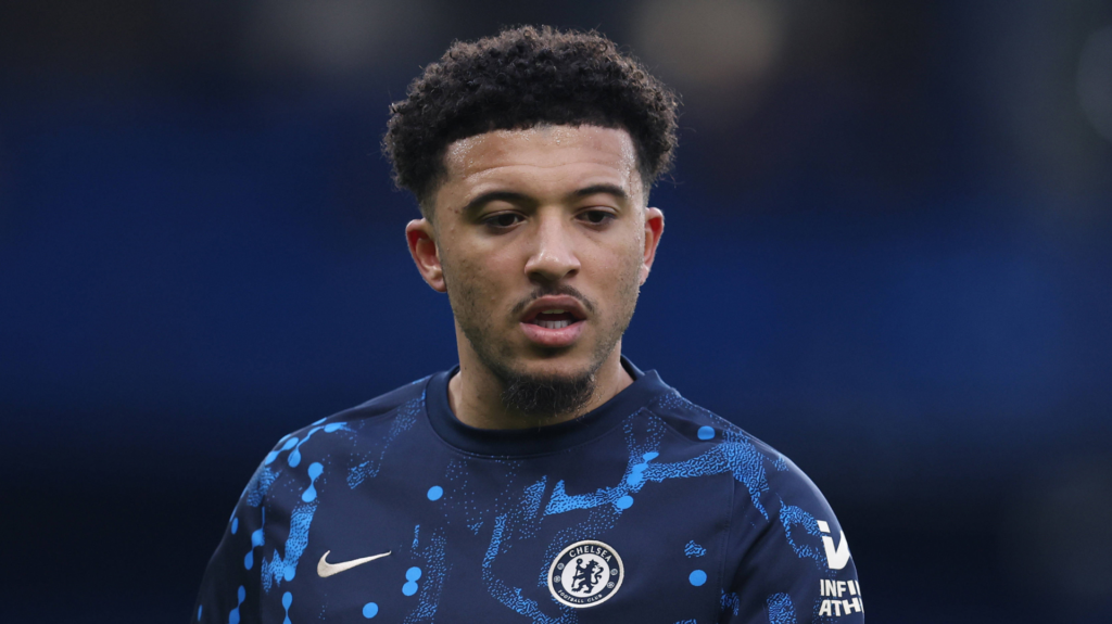 Jadon Sancho looking down while playing for Chelsea