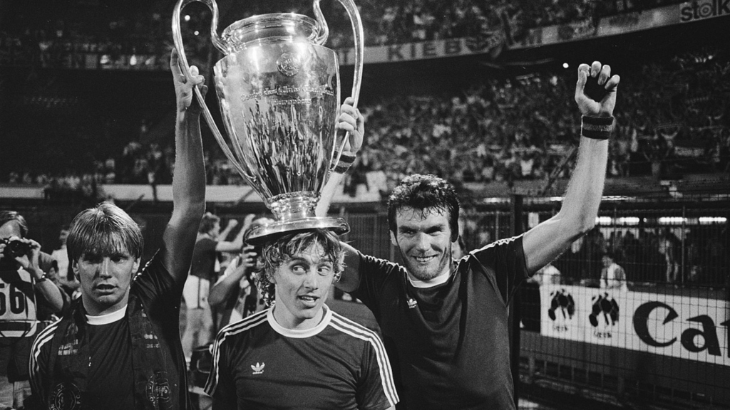 Gary Shaw and Peter Withe lifting the European Cup in Rotterdam