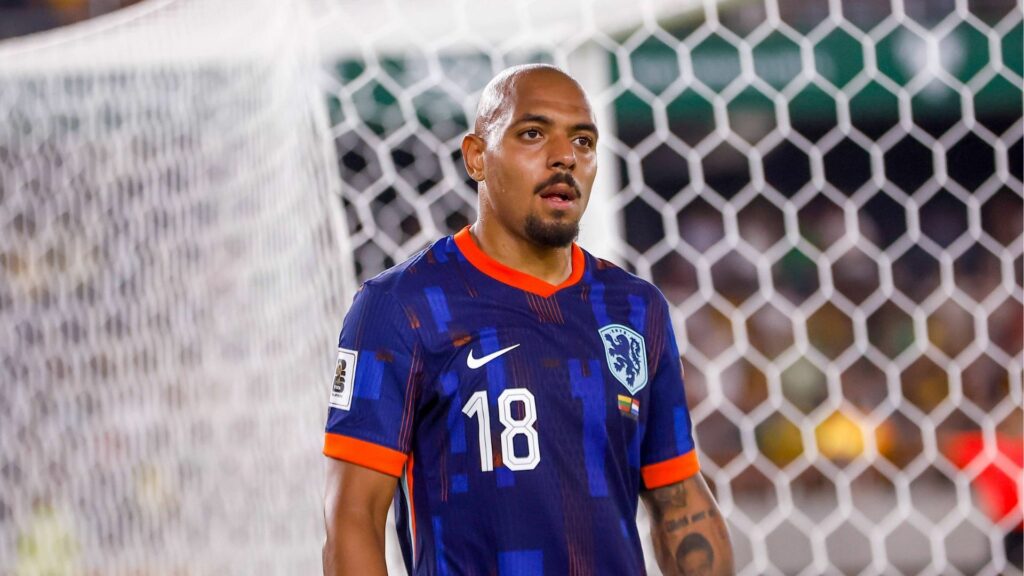 Donyell Malen playing for the Netherlands looking concerned