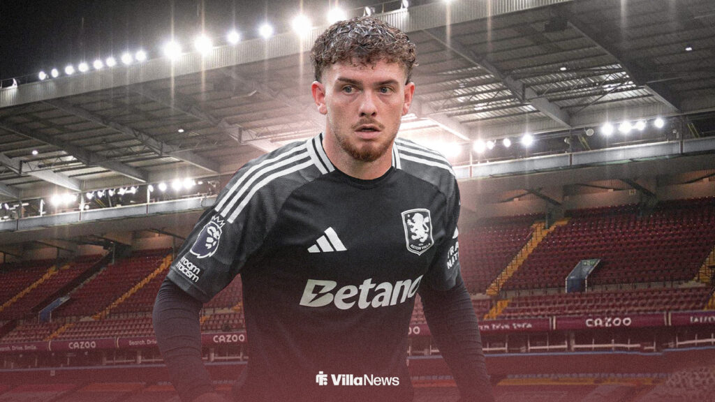 Harvey Elliott wearing an Aston Villa away shirt at Villa Park