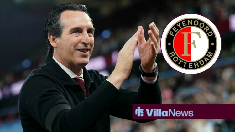 Aston Villa manager Unai Emery smiles and applauds in the direction of the Feyenoord badge, which features in a circular inset.