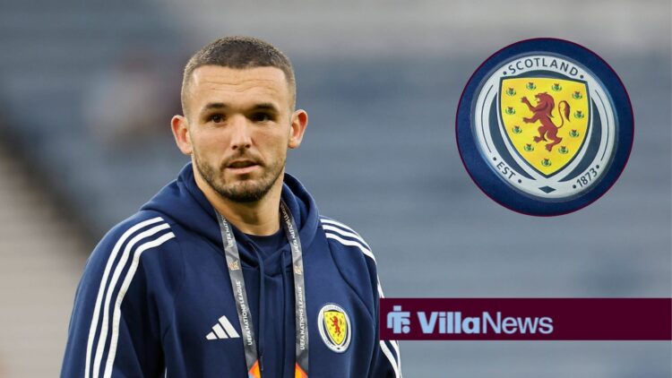 John McGinn before Scotland game with Scotland badge in circle