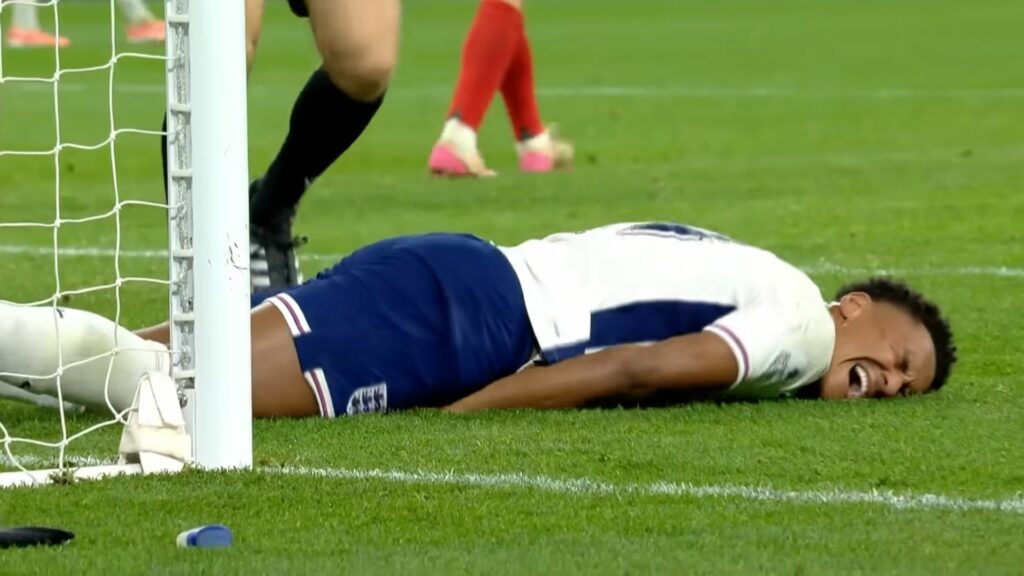 Ollie Watkins in pain after suffering an injury playing for England