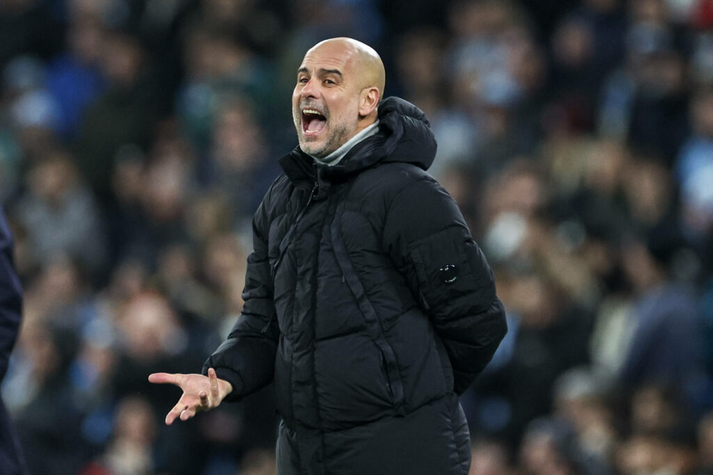 Pep Guardiola shouting on the touchline at Manchester City