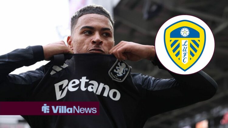 Morgan Rogers frustrated looking at the Leeds United badge.