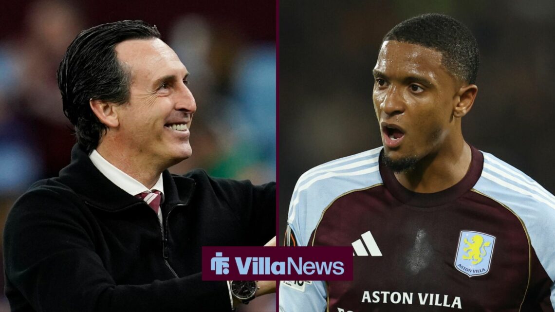 Unai Emery smiling in the direction of Ezri Konsa.