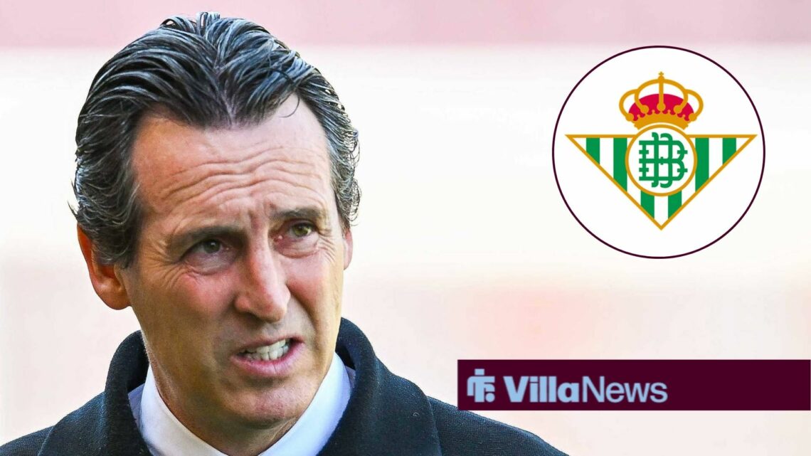Unai Emery looking closely at Real Betis badge in circular inset