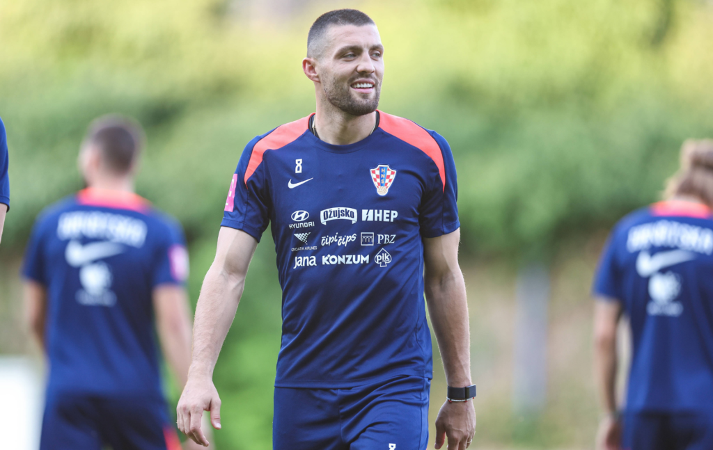 Aston Villa-linked midfielder Mateo Kovacic warming up for the Croatia national team.