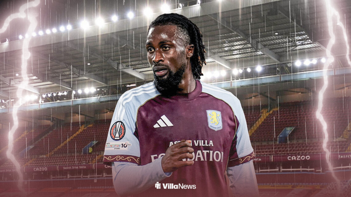Evann Guessand looking annoyed playing for Aston Villa at Villa Park surrounded by rain and lightning