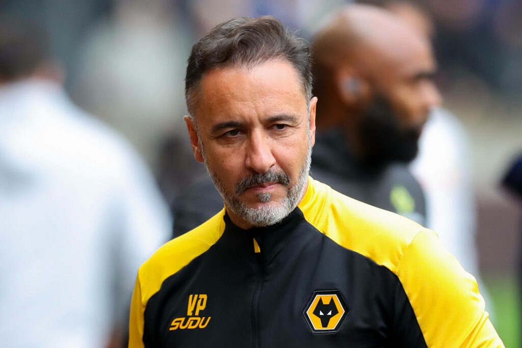 Former Wolves manager Vitor Pereira stands on the touchline looking concerned.
