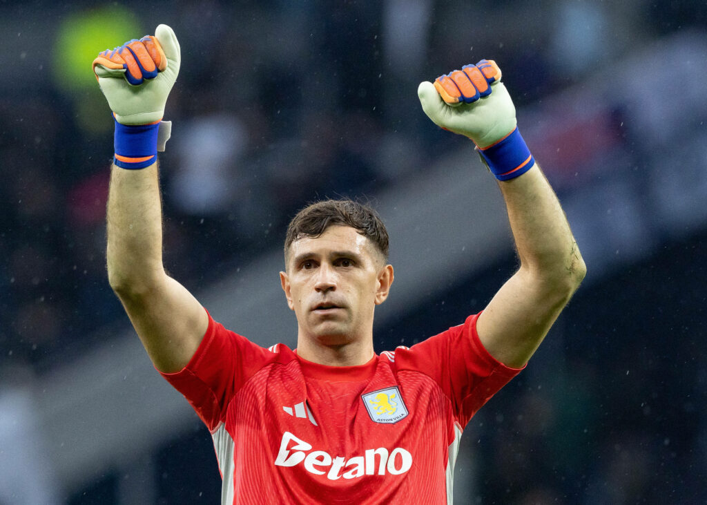 Emi Martinez celebrating in an Aston Villa shirt