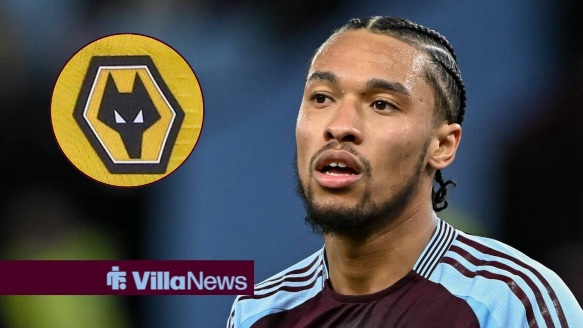 Boubacar Kamara looking at the Wolves badge.