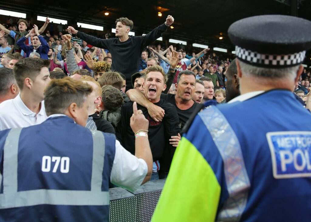 Aston Villa fans clashing with stewards and police