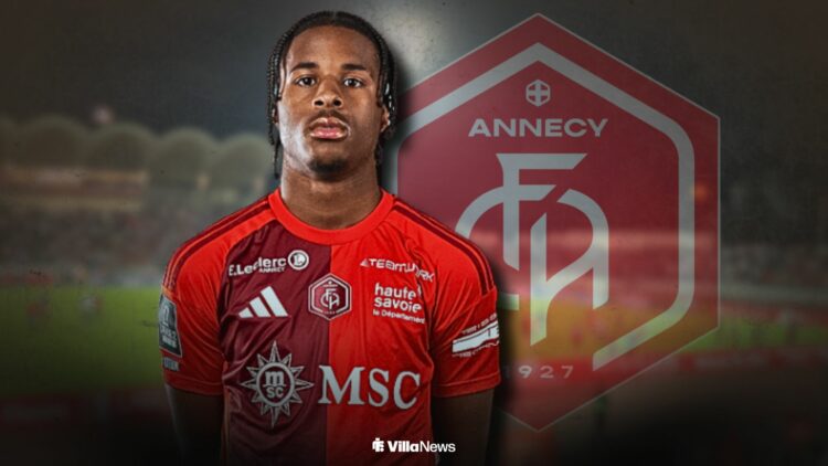 Triston Rowe in an Annecy shirt standing infront of an Annecy badge