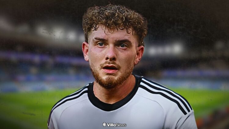 Harvey Elliott in a plain shirt at Villa Park