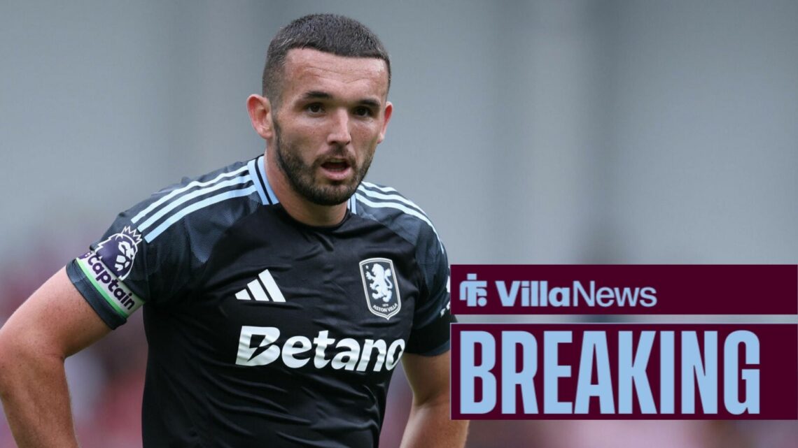 John McGinn with his hands on his hips.