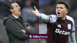 Jadon Sancho looking annoyed pointing towards Unai Emery