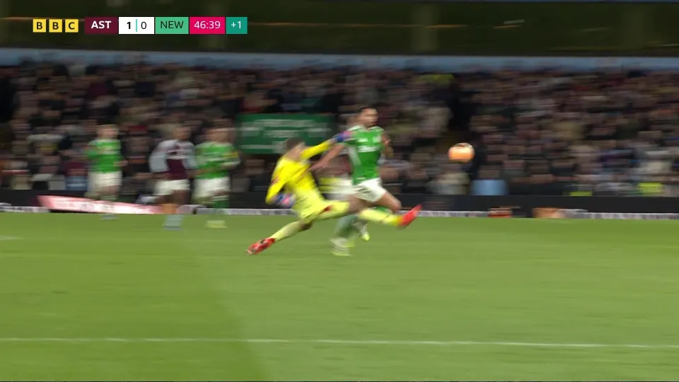 Marco Bizot tackle on Jacob Murphy in Aston Villa 1-3 Newcastle United at Villa Park