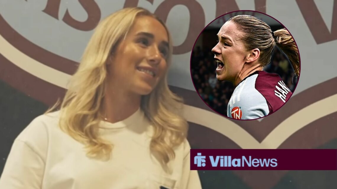 Missy Bo Kearns smiles, as Kirsty Hanson celebrates a goal