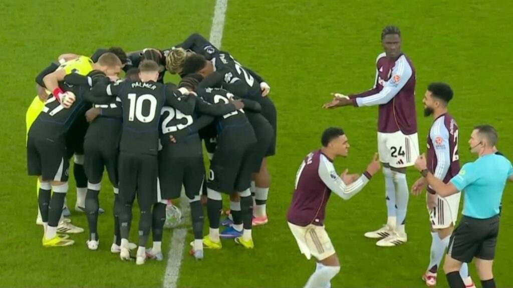 Chelsea players huddling around the centre circle before second half against Aston Villa at Villa Park