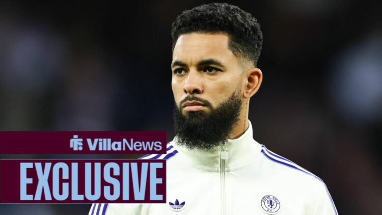 Douglas Luiz in an Aston Villa jacket