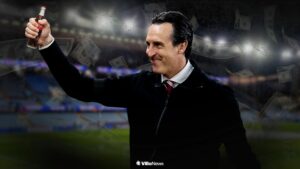 Unai Emery holding a Coca-Cola bottle at Villa Park