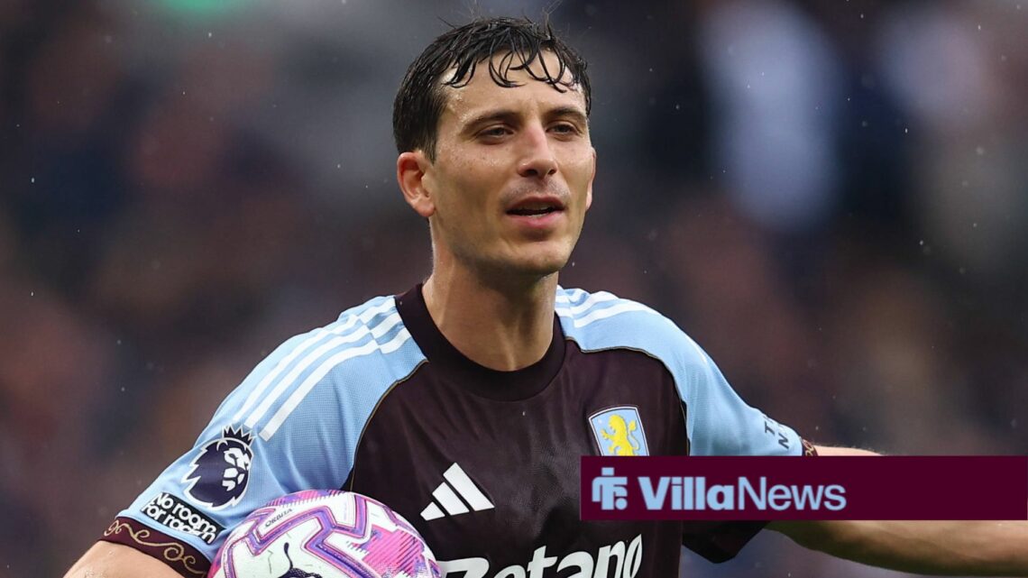 Pau Torres in action for Aston Villa with Premier League ball in hand