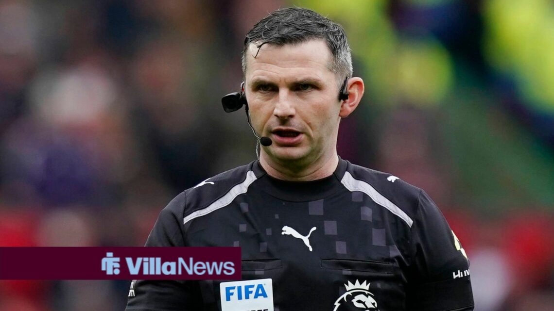 Manchester, England, 7th February 2026. Referee Michael Oliver wearing a ref camon the side of his head during the Manchester United, ManU vs Totte...