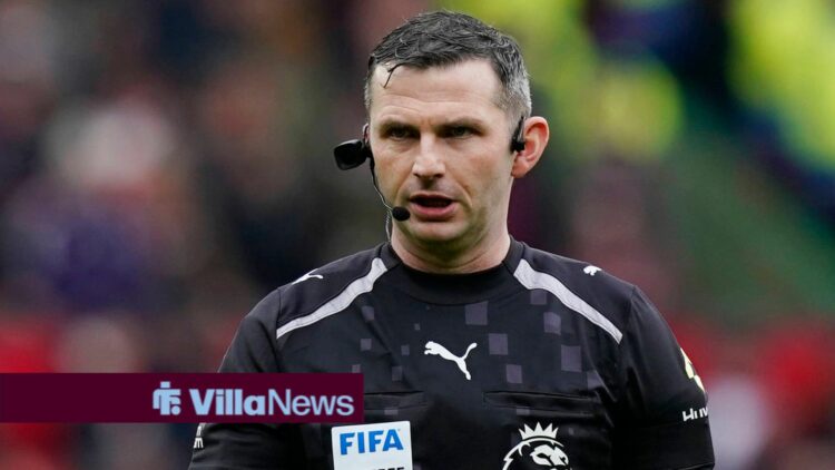 Manchester, England, 7th February 2026. Referee Michael Oliver wearing a ref camon the side of his head during the Manchester United, ManU vs Totte...