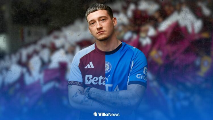 Louie Barry in a half Aston Villa and Stockport County shirt