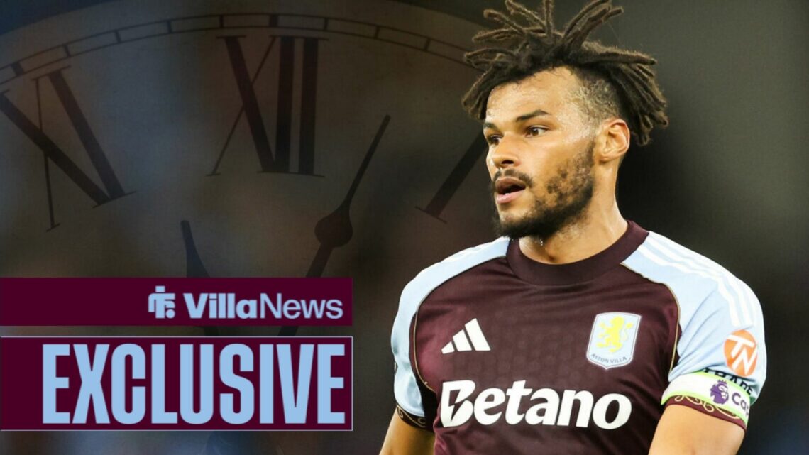 Tyrone Mings in an Aston Villa kit with a concentrated look on his face