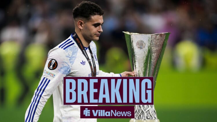 Andres Garcia of Aston Villa FC walks past to the trophy during the award ceremony following the UEFA Europa League 2025 26 final football match be...